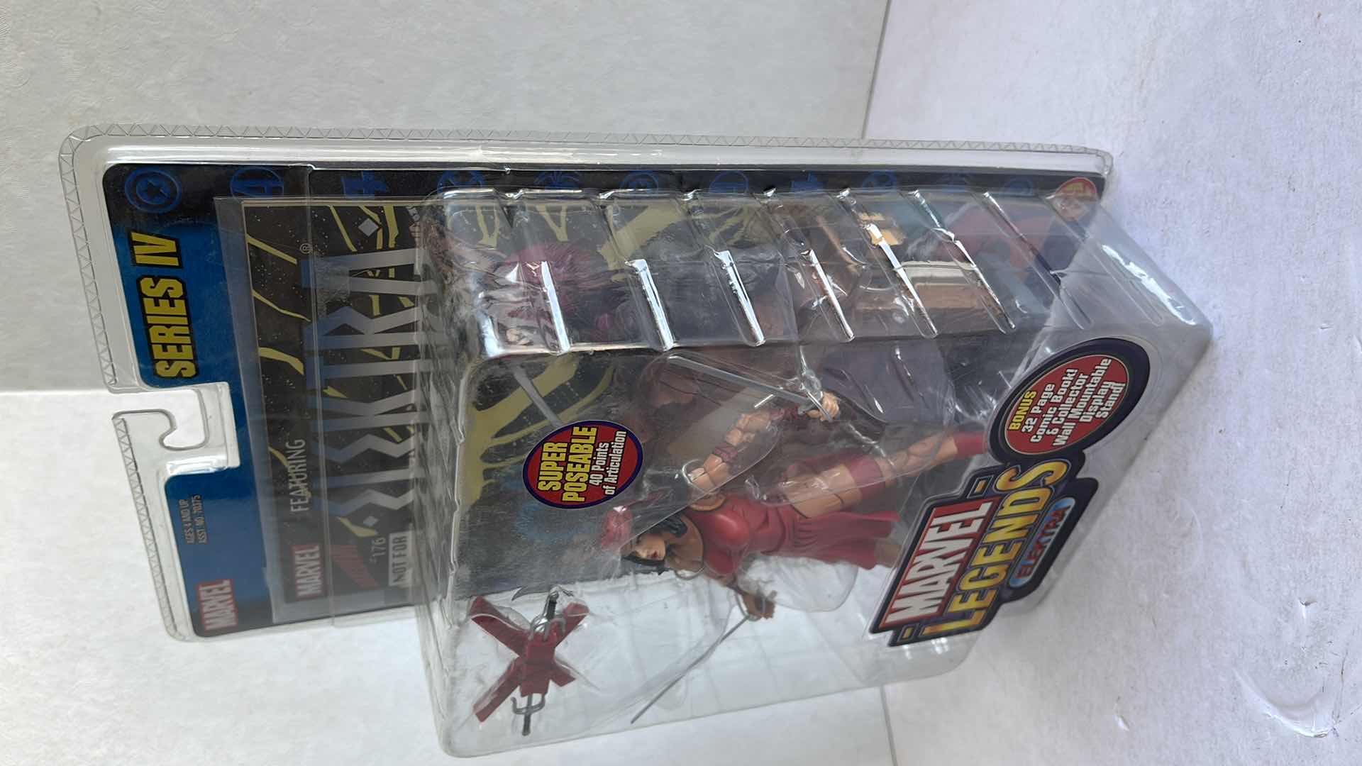 Photo 3 of NIB MARVEL LEGENDS ELEKTRA SERIES IV ELEKTRA COMIC MSRP $29.99