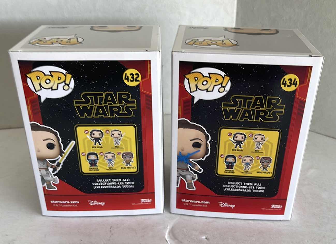 Photo 2 of NIB FUNKO POP STAR WARS REY #432 YELLOW LIGHTSABER & REY #434 TWO LIGHTSABERS MSRP $20