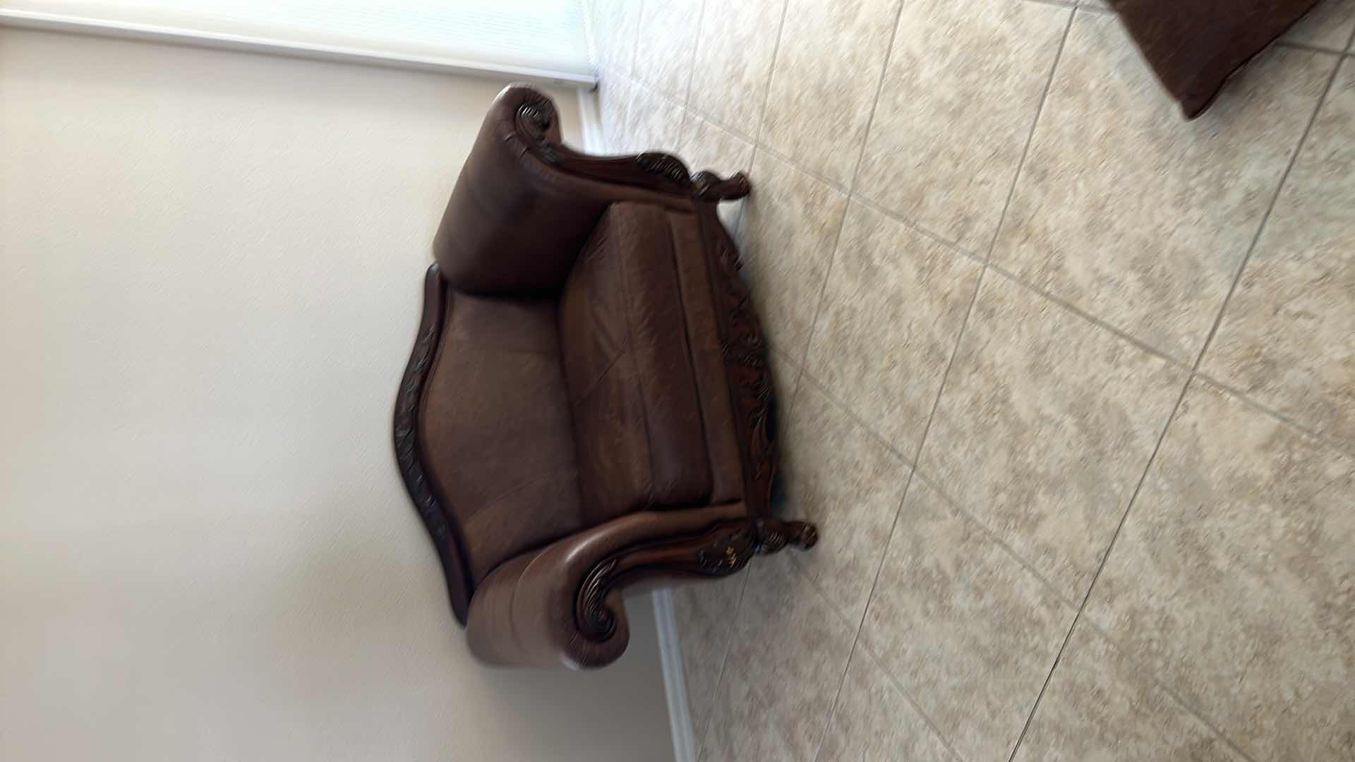 Photo 7 of BROWN LEATHER W ORNATE CHERRY TRIM OVERSIZED ARM CHAIR