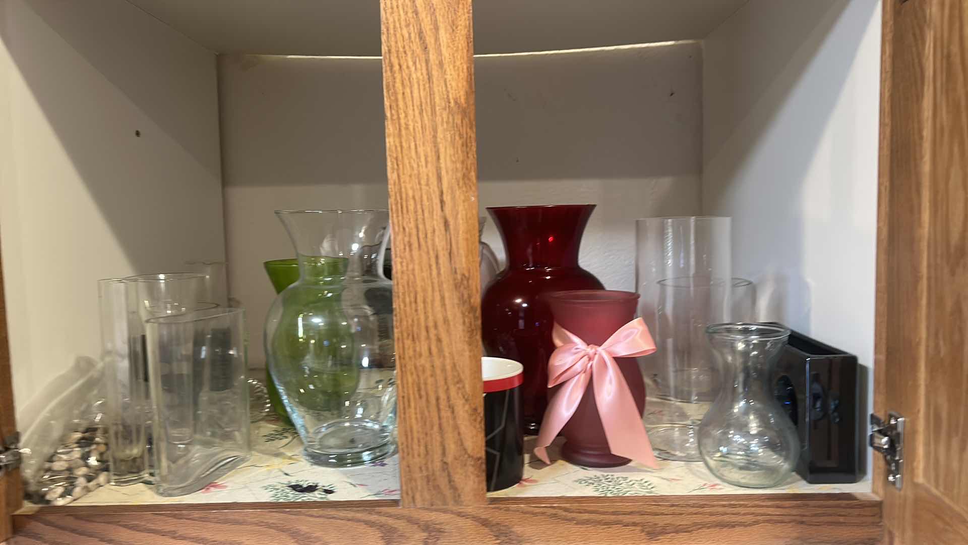 Photo 1 of CONTENTS OF CABINET IN KITCHEN- VASES