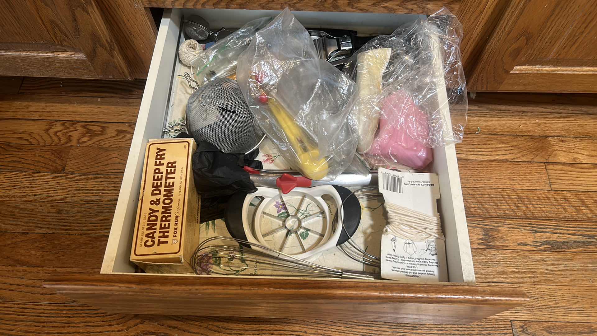 Photo 3 of CONTENTS OF 2 PULL OUT DRAWERS IN KITCHEN