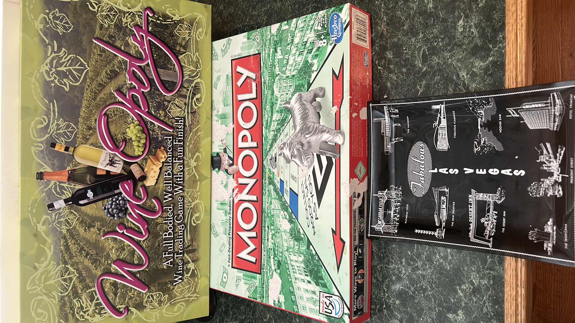 Photo 1 of WINE OPOLY AND MONOPOLY GAMES AND LAS VEGAS DISH