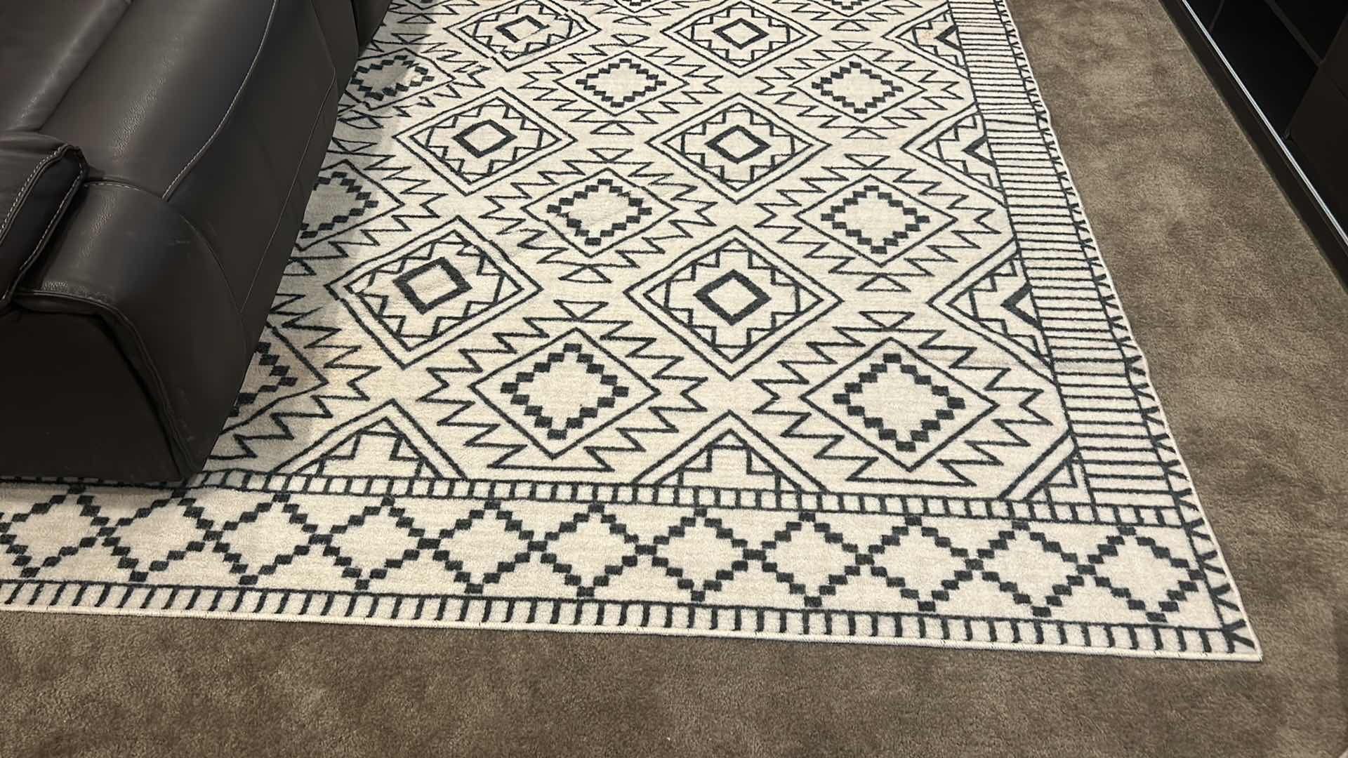 Photo 1 of OFF-WHITE AND BLACK AREA RUG 7‘ x 10‘