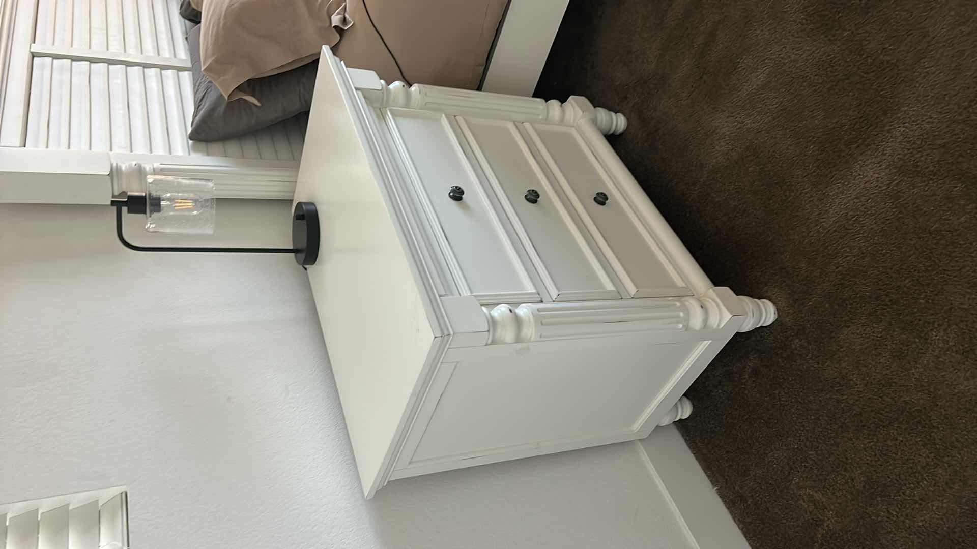 Photo 2 of WHITE 3 DRAWER SLIGHTLY DISTRESSED NIGHTSTAND (LAMP SOLD SEPARATELY) 33” x 19” x 32 1/2”