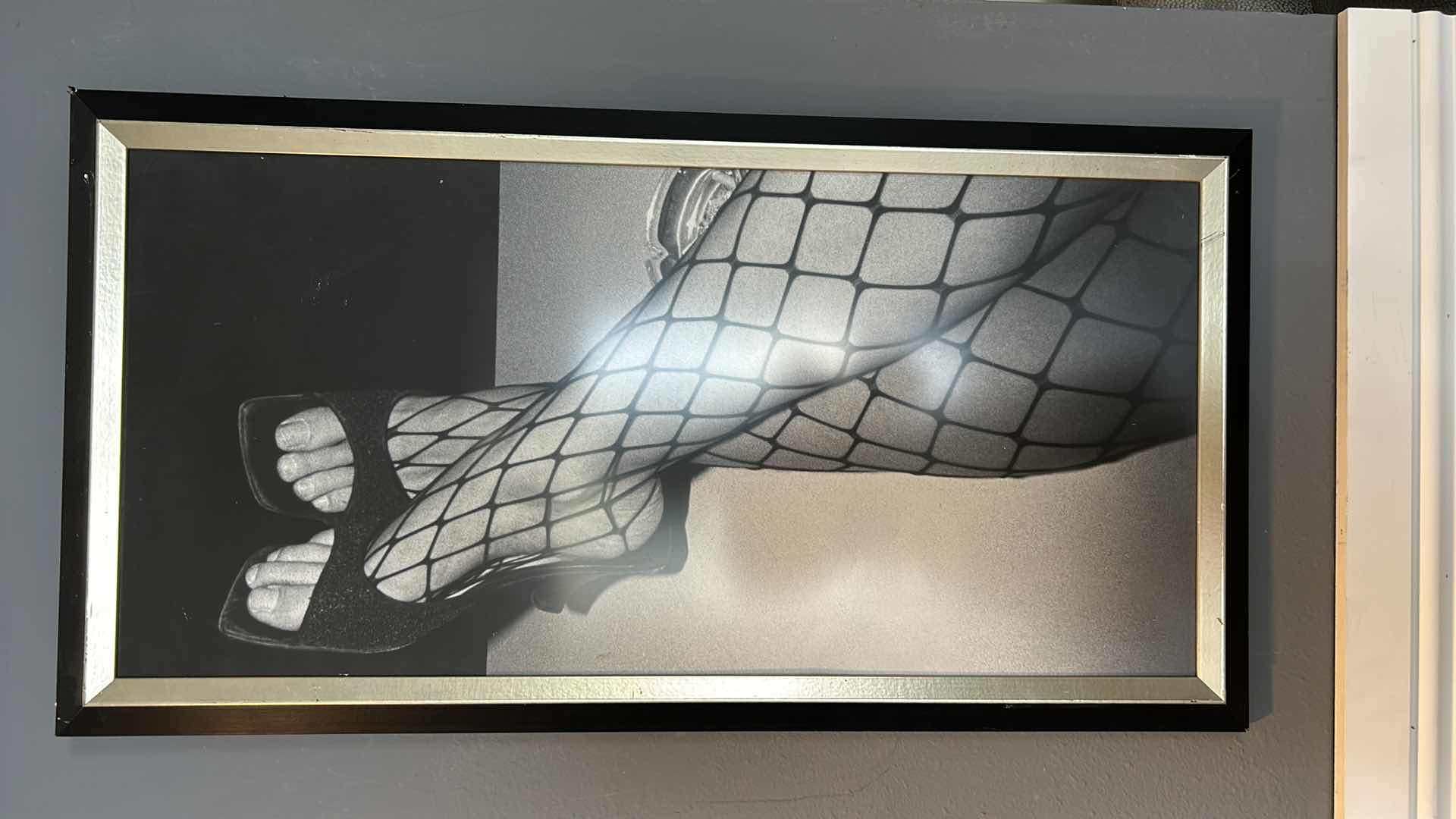 Photo 1 of BLACK AND GOLD FRAMED PRINT. “BLACK FISHNET STOCKINGS” ARTWORK 19" X H35.5".