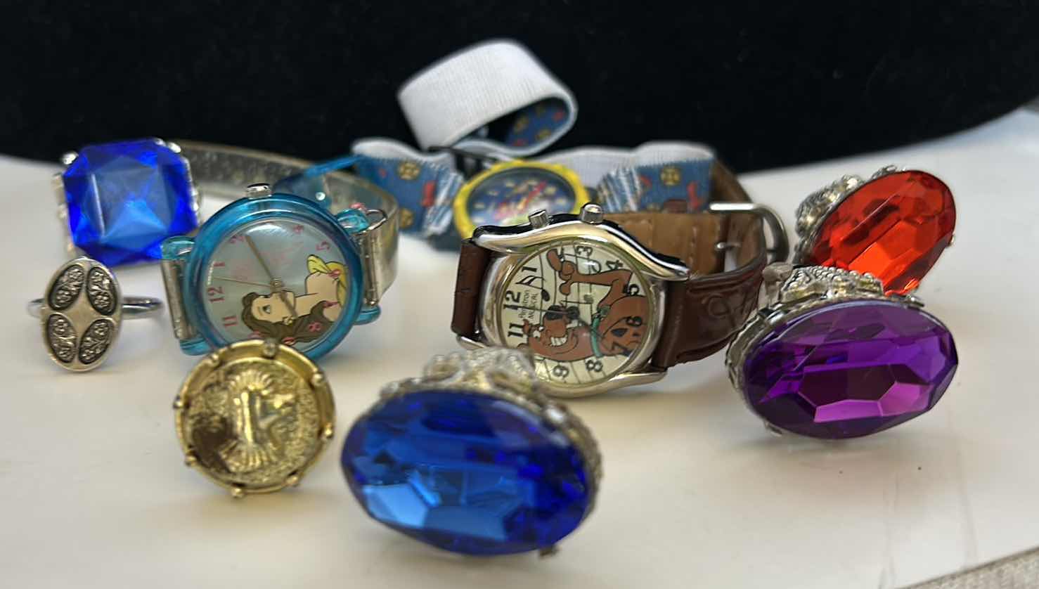 Photo 1 of CHILDREN’S WATCHES AND COSTUME JEWELRY.