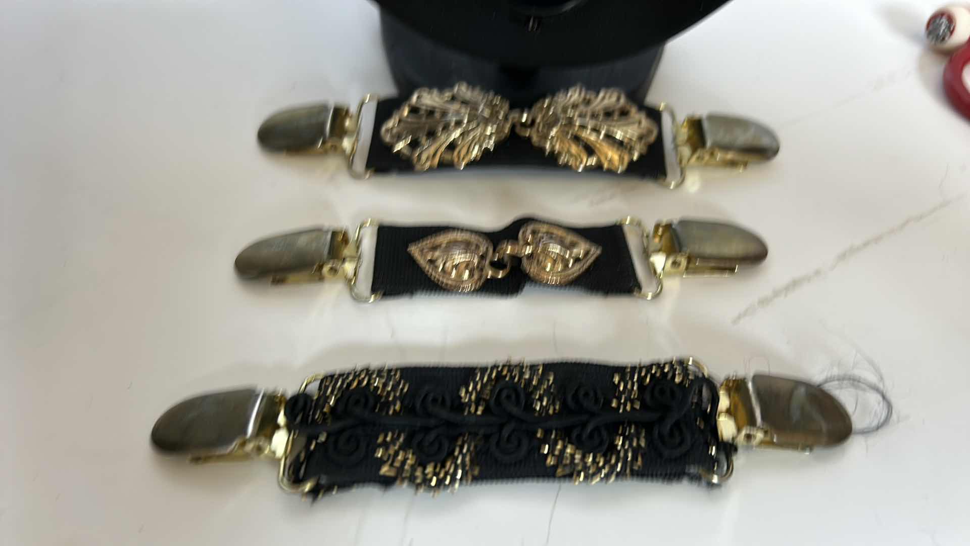 Photo 2 of COSTUME JEWELRY. TWO NECKLACES AND THREE BLOUSE CLIPS.