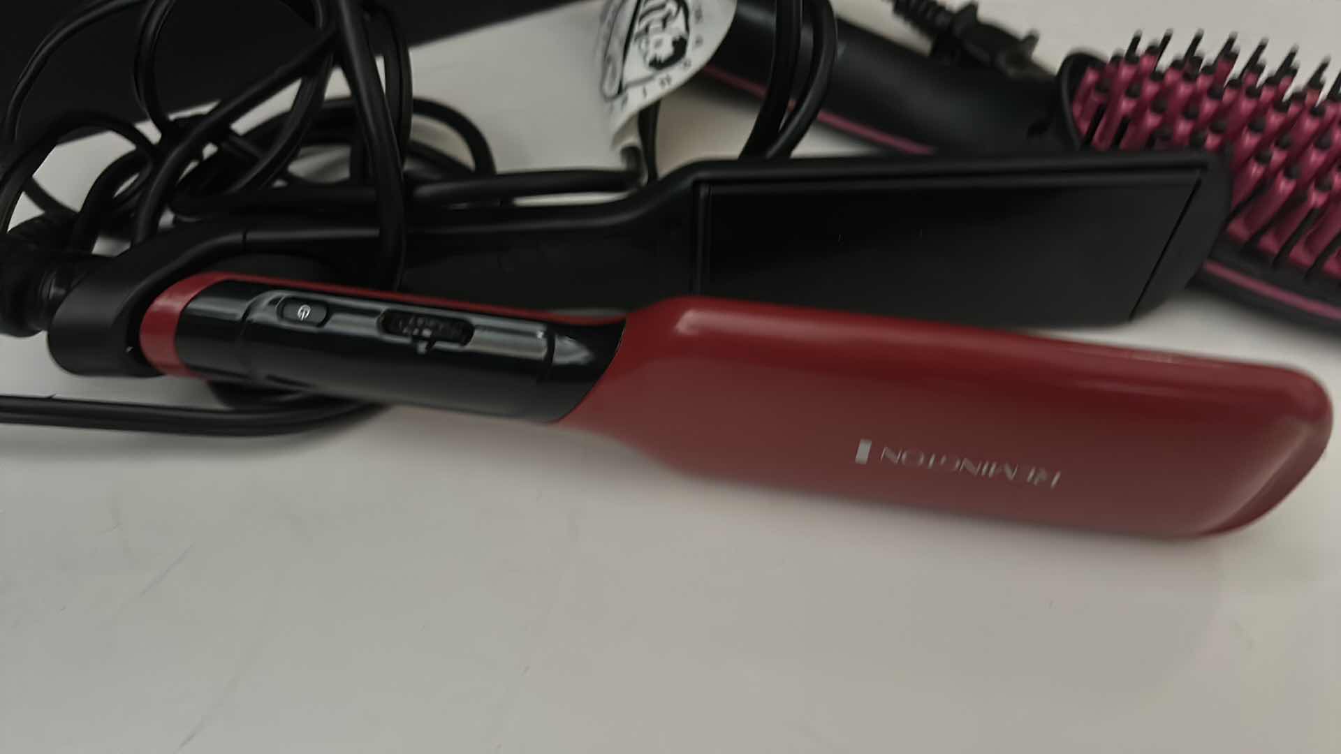 Photo 3 of HAIR STRAIGHTENING TOOLS.