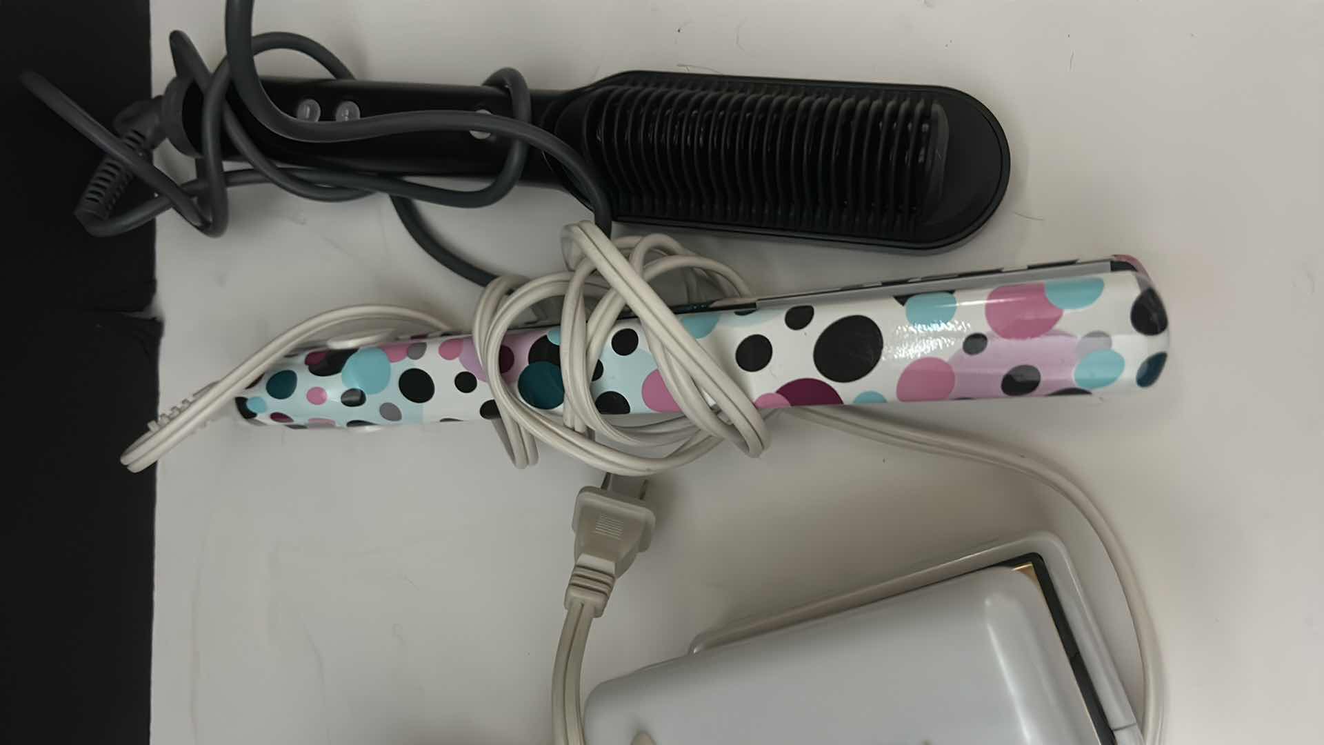 Photo 3 of HAIR STRAIGHTENING TOOLS.