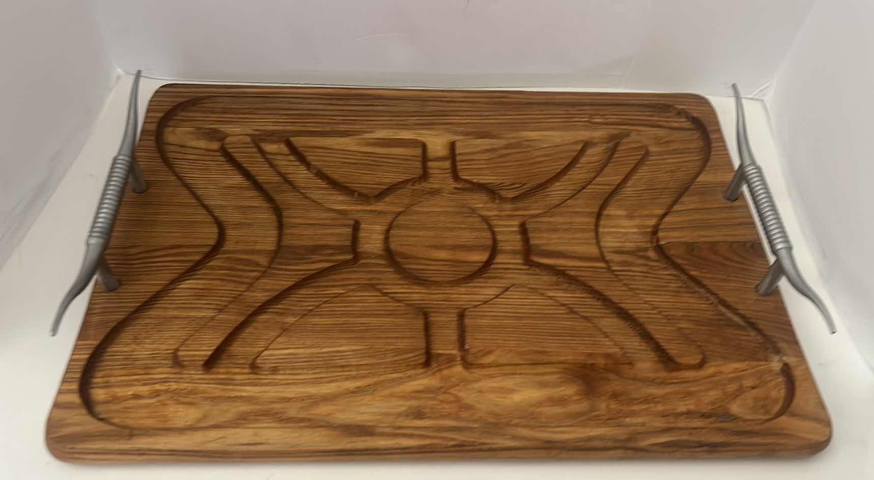 Photo 1 of CHARCUTERIE BOARD WITH METAL HORN HANDLES. 20” x 13 1/2”