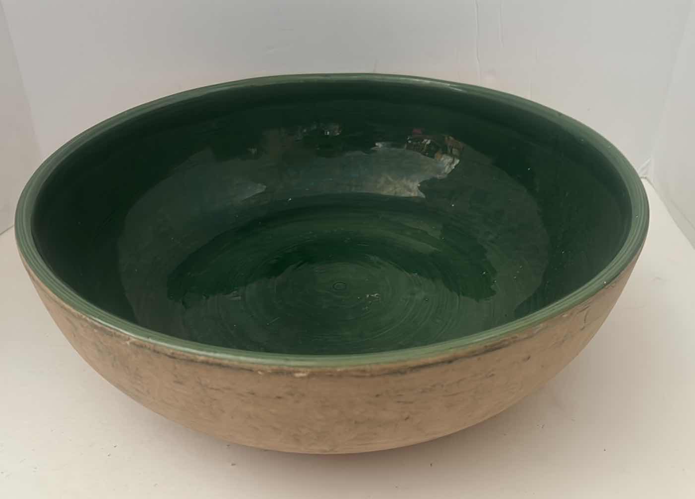 Photo 1 of HEAVY GREEN GLAZED POTTERY BOWL 16“ x H 5“