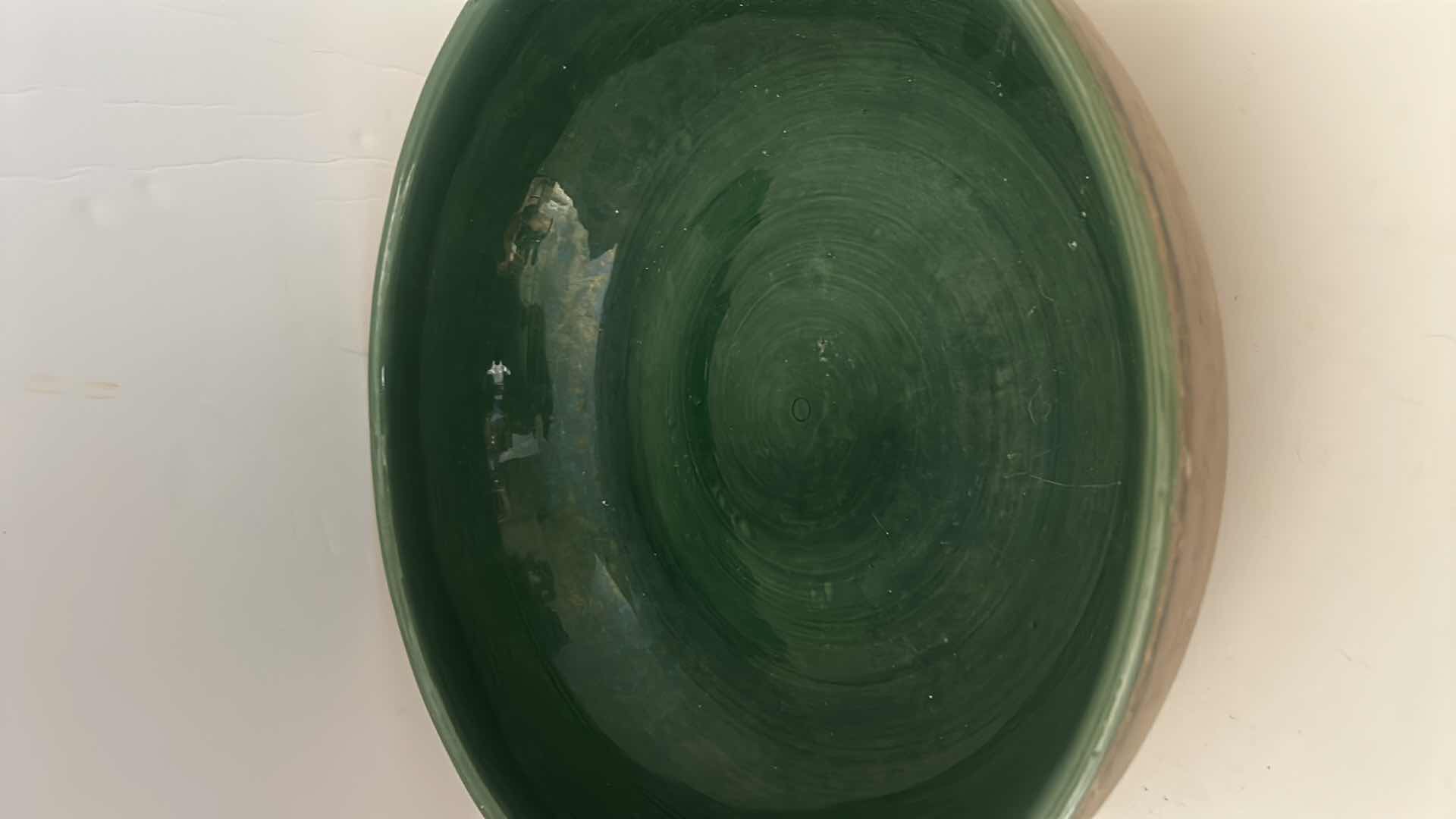 Photo 2 of HEAVY GREEN GLAZED POTTERY BOWL 16“ x H 5“