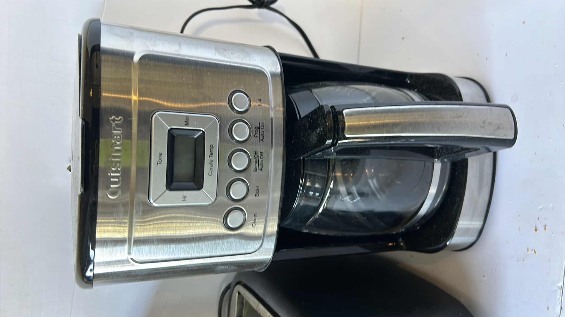 Photo 2 of HOUSEHOLD APPLIANCES. TWO COFFEE MAKERS, AN EXTRA COFFEE POT, AND A TOASTER.