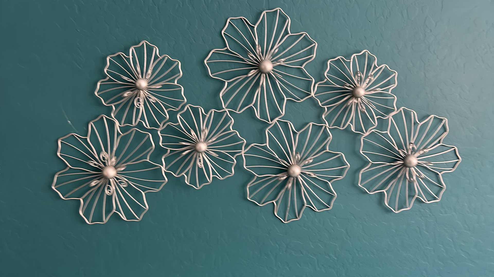 Photo 1 of METAL FLOWER WALL DÉCOR 42” X H 21”.