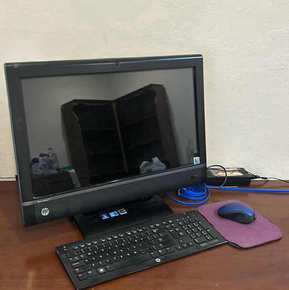 Photo 1 of HP DESKTOP COMPUTER, KEYBOARD AND MOUSE.