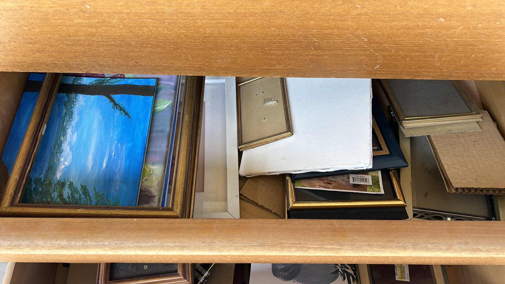 Photo 8 of CABINET FULL OF PICTURE FRAMES AND ART SUPPLIES.