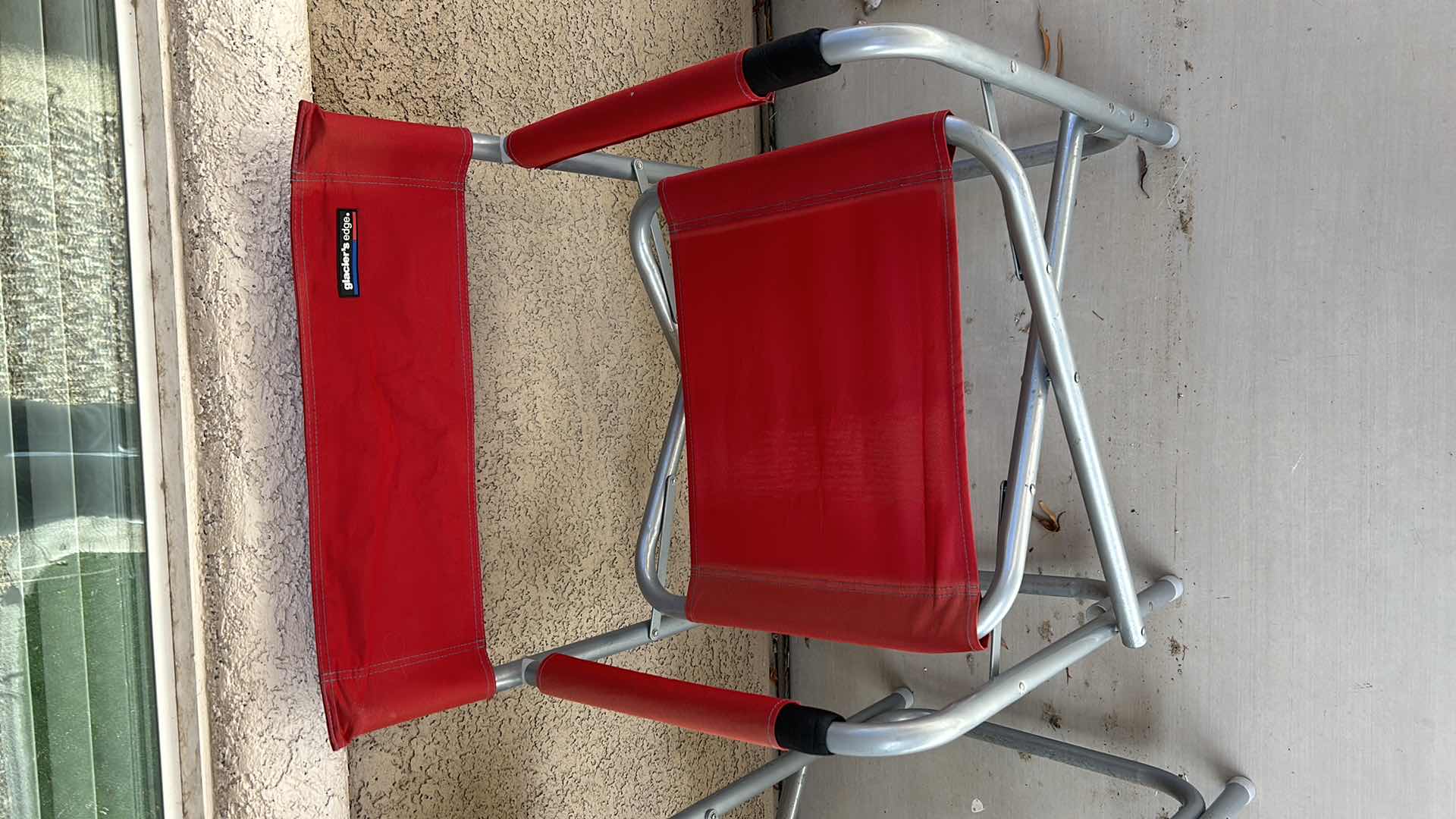 Photo 3 of TWO GLACIERS EDGE FOLDING CHAIRS.