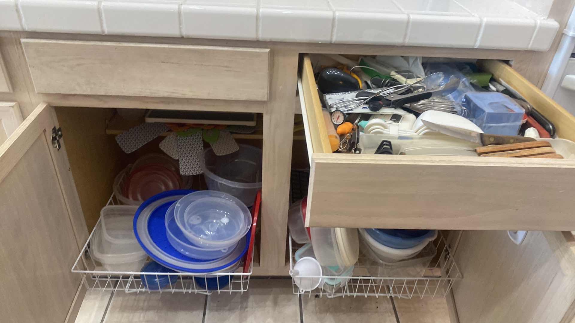 Photo 1 of CONTENTS OF KITCHEN CABINET & 1 DRAWER - KNIVES & TOOLS & PLASTIC STORAGE