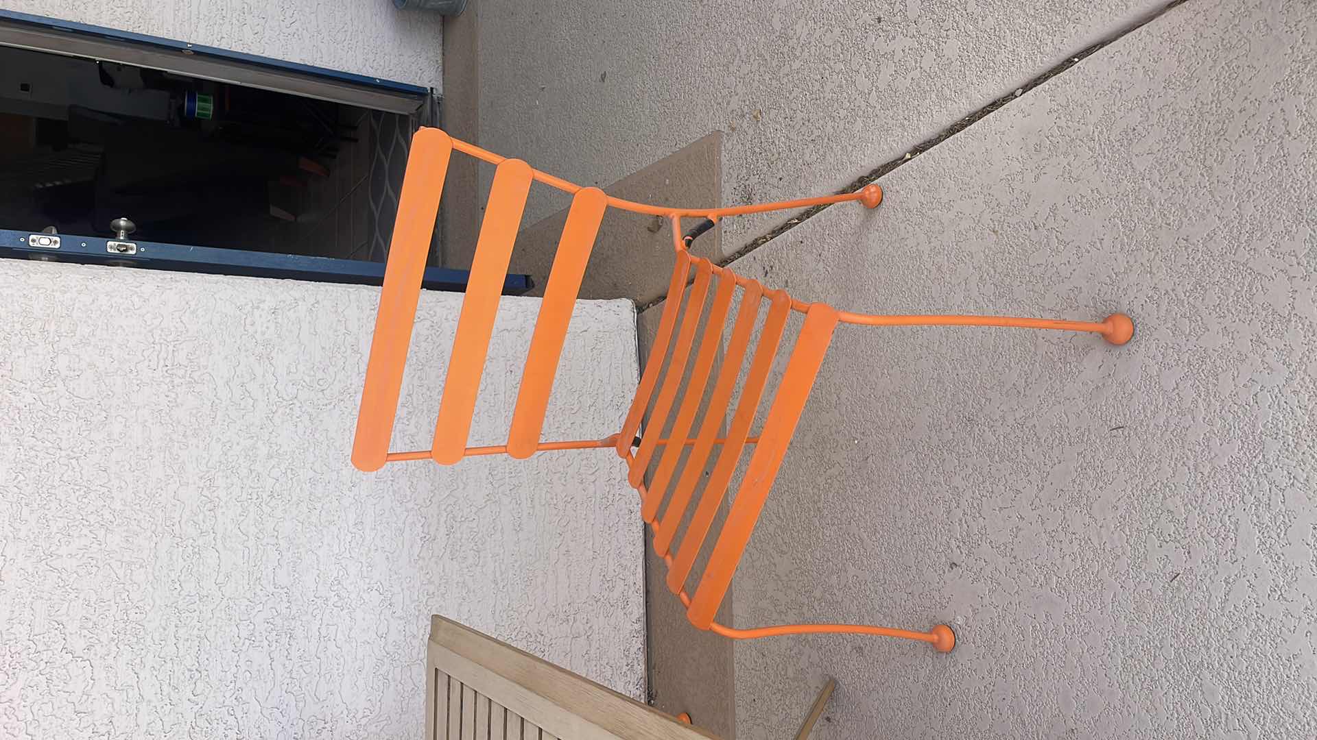 Photo 2 of OUTDOOR ALUMINUM TABLE 45”x45” H28” FOUR ORANGE CHAIRS