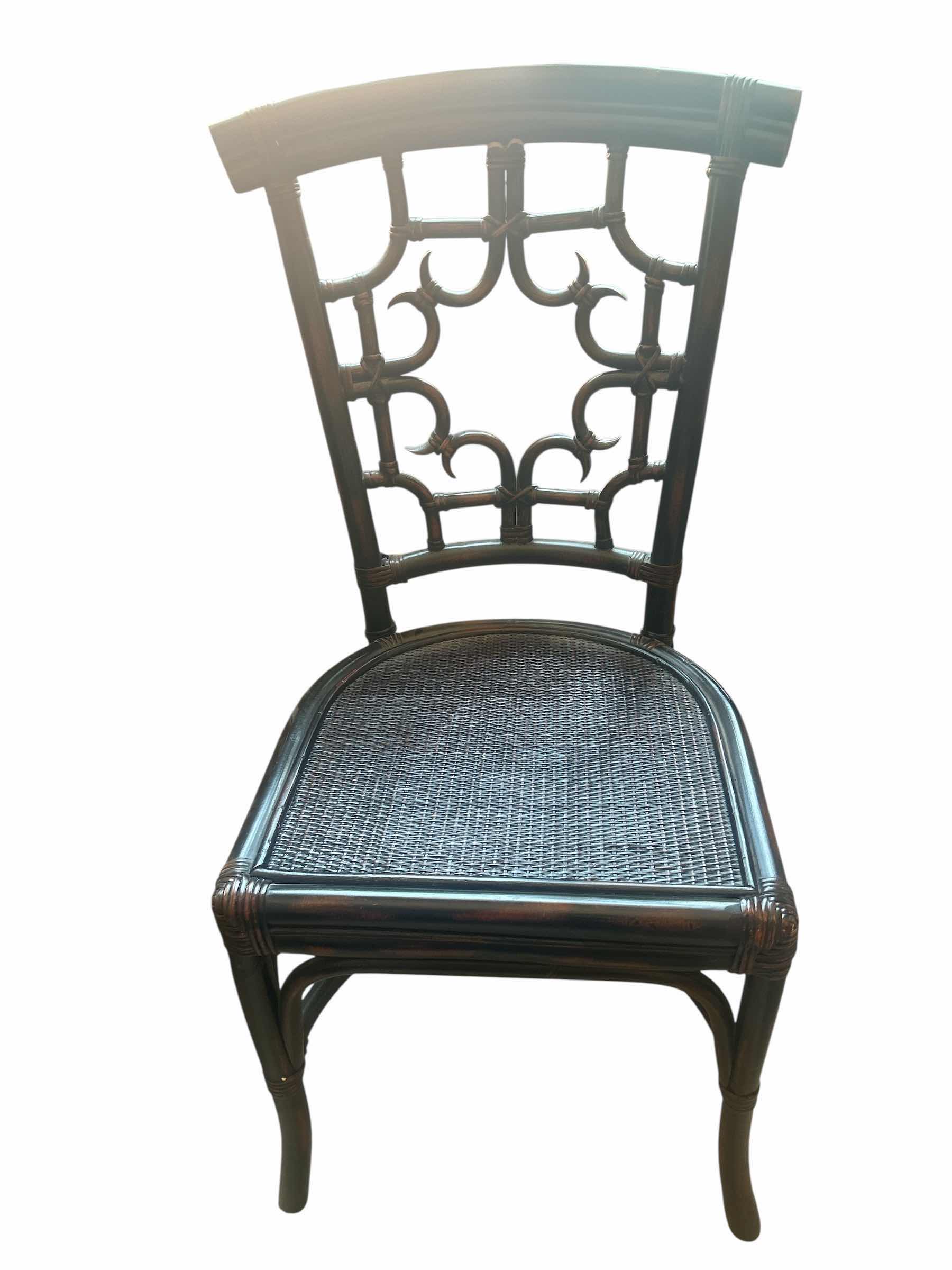 Photo 1 of PIER 1 IMPORTS WOVEN RATTAN SIDE DINING CHAIR
21” x 20” x H37 1/2”