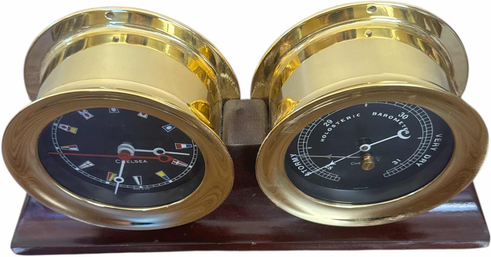 Photo 1 of CHELSEA NAUTICAL FLAG CLOCK AND BAROMETER DESK SET ON MAHOGANY BASE

14” X 3” X H6.5”