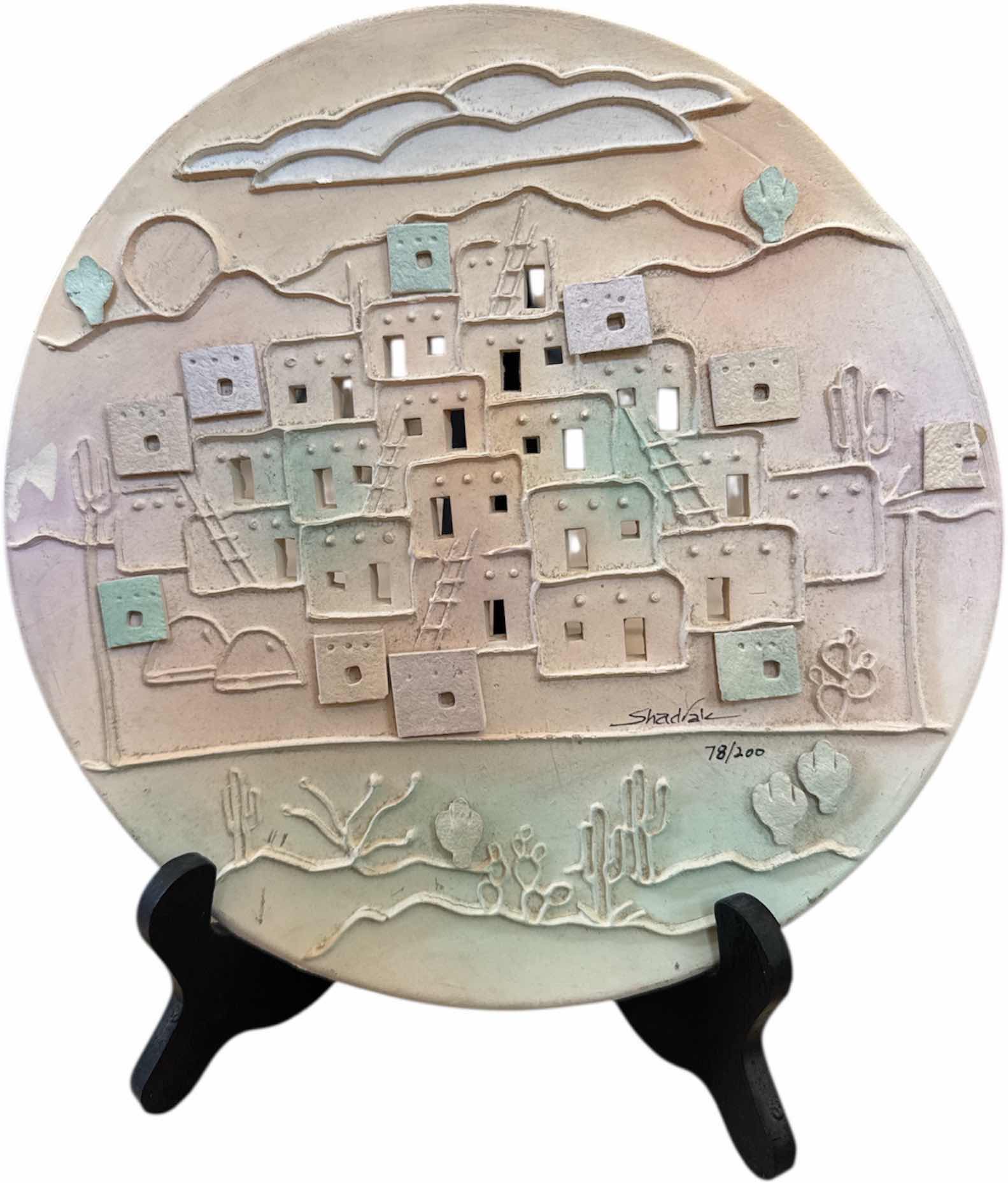 Photo 1 of 4- VINTAGE LA TAMITO BY SHADRAK 78/200, ARTWORK, AND 3 METAL CANDLEHOLDERS, BLACK

PLATE
D10”