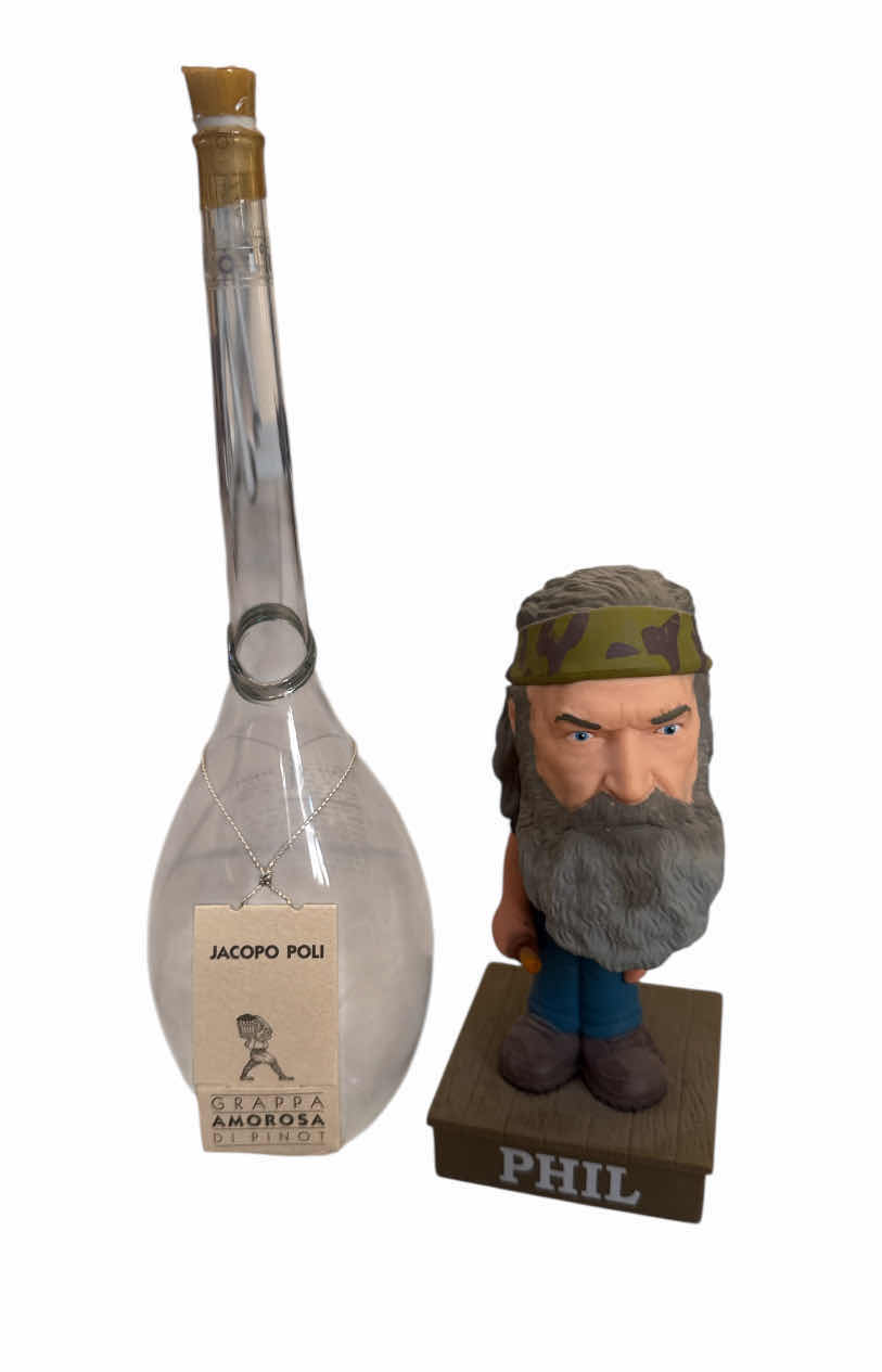Photo 1 of DUCK DYNASTY PHIL KNOCKER BOBBLEHEAD AND JACOPO POLI GRAPPA AMOROSA DI PINOT BOTTLE
BOTTLE
H11.5”