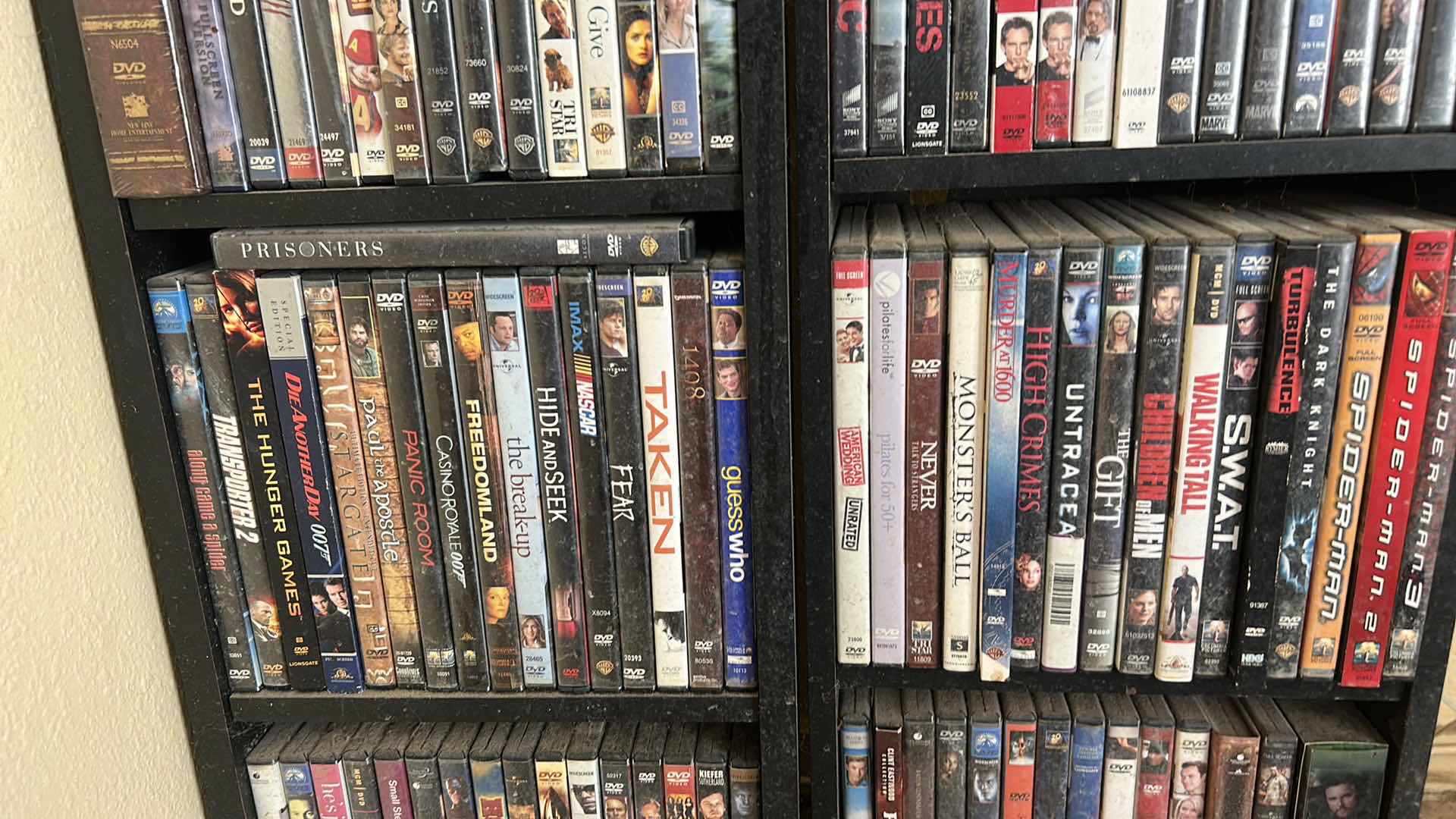 Photo 1 of 2 BLACK SHELVING UNITS WITH DVD’s