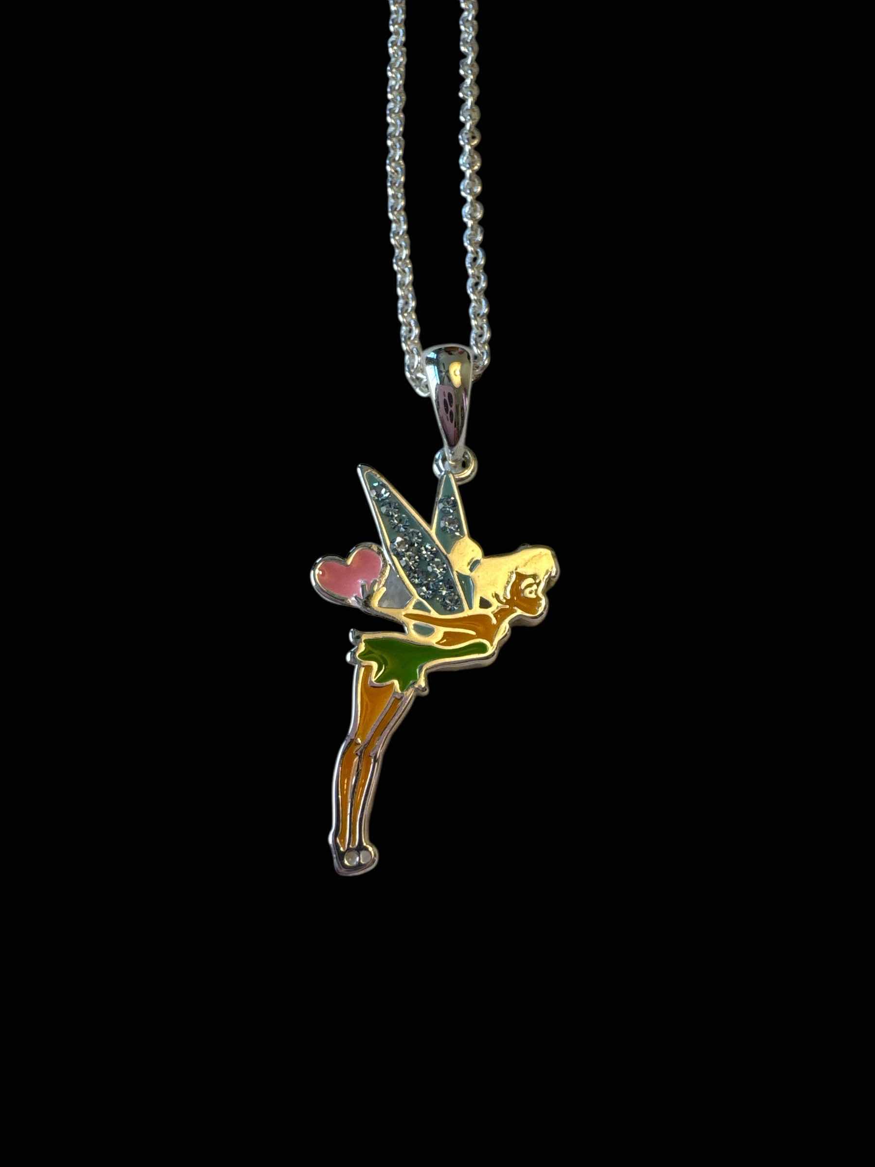 Photo 1 of DISNEY’S TINKERBELL HEART PENDANT,  SILVER TONE JEWELRY 

NECKLACE
18”