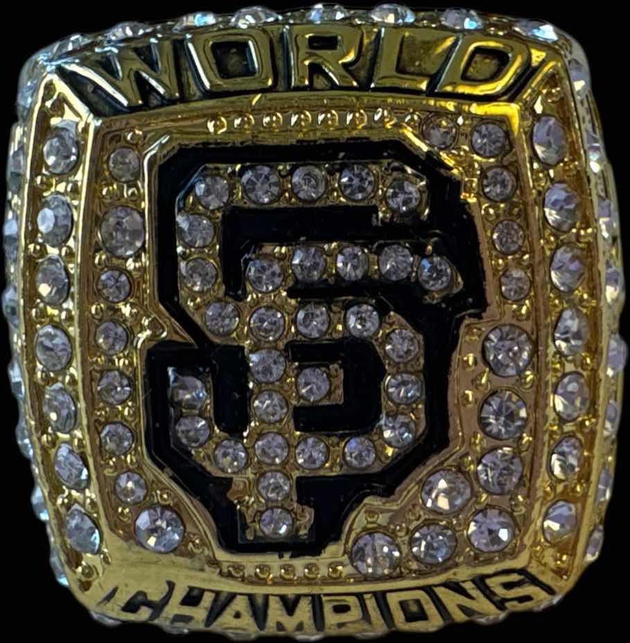 Photo 1 of REPLICA 2012 SAN FRANCISCO GIANTS WORLD SERIES CHAMPIONSHIP RING, GOLD TONE JEWELRY
APPROXIMATE SIZE 12