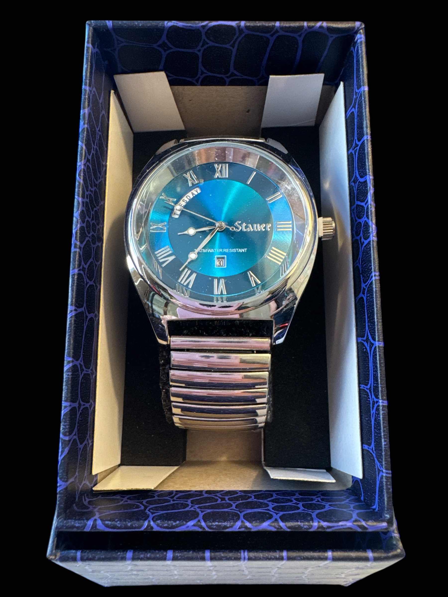 Photo 1 of STAUER MENS SILVER TONE WATCH

D1.5”