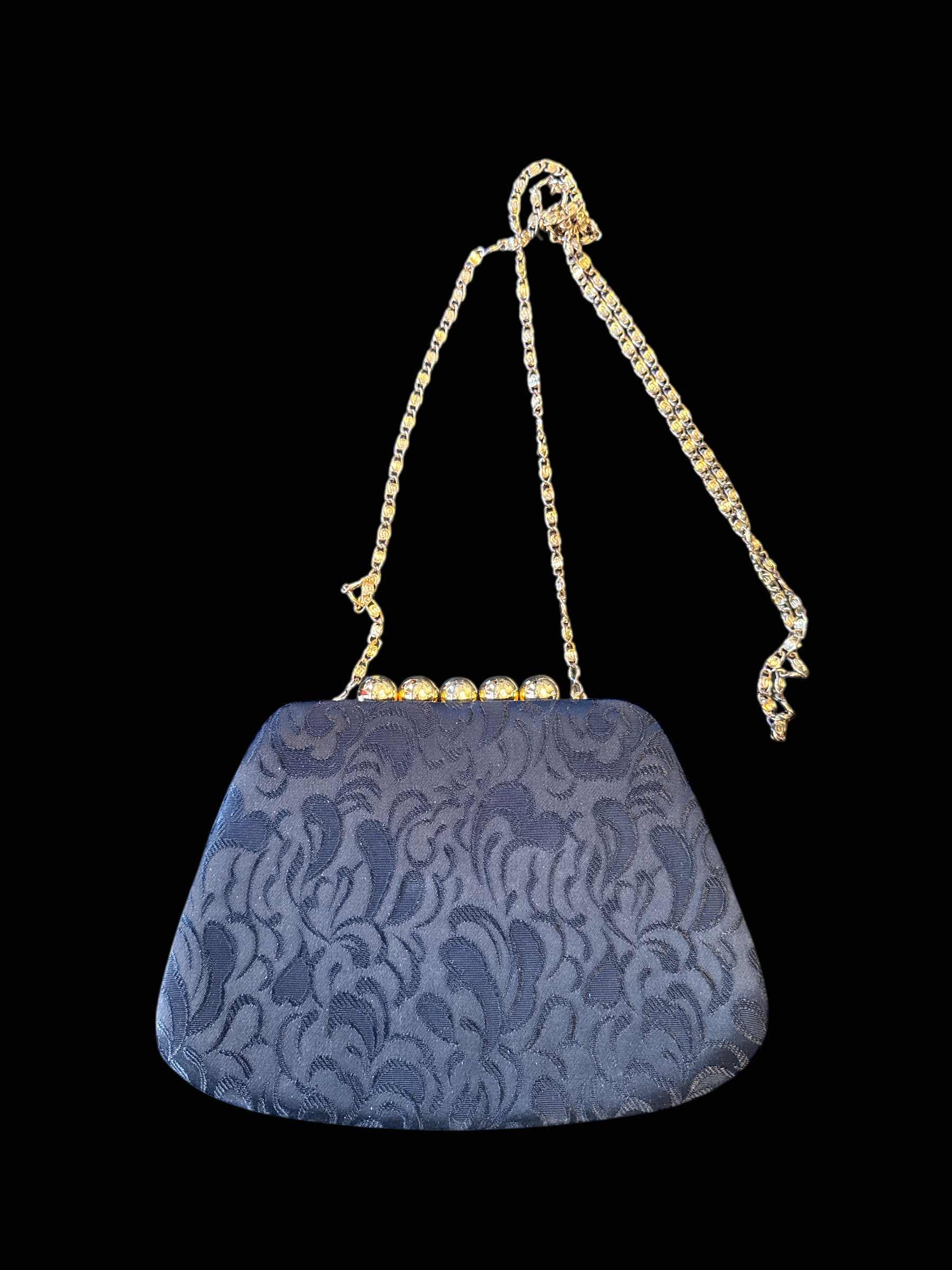 Photo 1 of VINTAGE CLUTCH PURSE BLACK AND GOLD

H6”