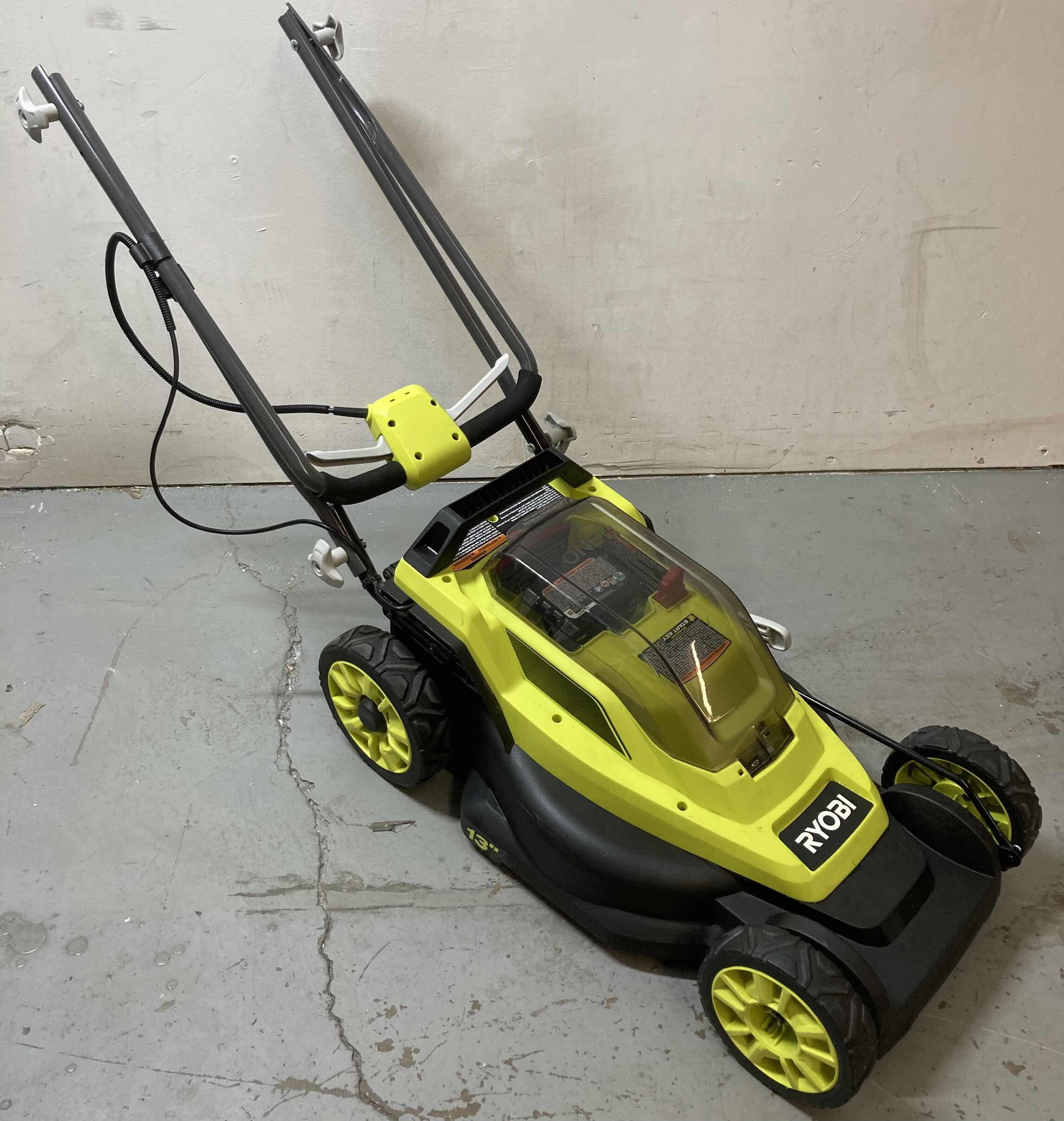 Photo 1 of RYOBI CORDLESS 18V 13" ELECTRIC LAWNMOWER W RECHARGEABLE BATTERY MODEL P1108VNM