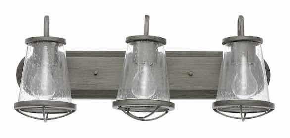 Photo 1 of HOME DECORATORS COLLECTION GEORGINA 3 LIGHT INDUSTRIAL RUSTIC VANITY FIXTURE W CLEAR SEEDED GLASS SHADES MODEL HB2626-322 24” X 9.75”