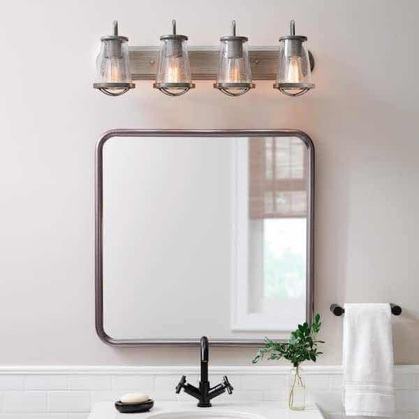 Photo 2 of HOME DECORATORS COLLECTION GEORGINA 4 LIGHT INDUSTRIAL RUSTIC VANITY FIXTURE W CLEAR SEEDED GLASS SHADES MODEL HB2584-322 30” X 9.75”