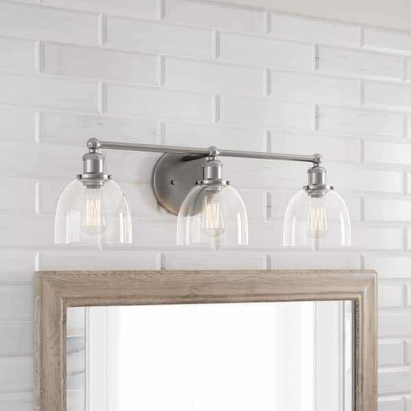 Photo 3 of HOME DECORATORS COLLECTION 26.75” EVELYN BRUSHED NICKEL 3 LIGHT INDUSTRIAL VANITY FIXTURE W CLEAR GLASS SHADES MODEL HB2586-35