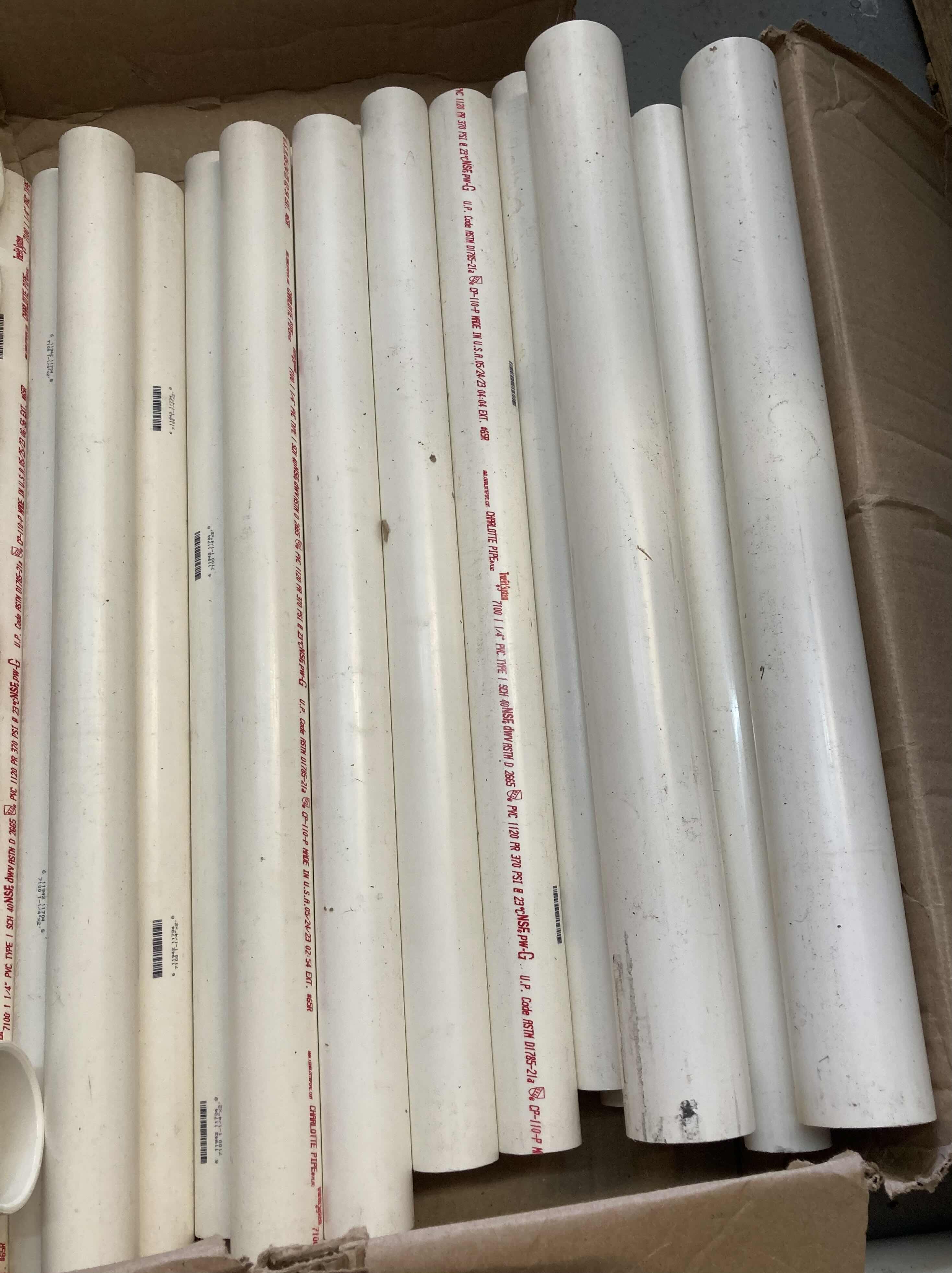 Photo 2 of Charlotte  PVC PIPES 1-1/4” X 24” (19) & PVC PIPES 2.25” X 24” (2) W 2” COUPLINGS & ADAPTER COUPLINGS