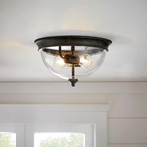 Photo 2 of HAMPTON BAY IRVING 13” BRONZE FINISH 2-LIGHT FLUSH MOUNT CEILING LIGHT W CLEAR SEEDED GLASS SHADE MODEL 21093-000