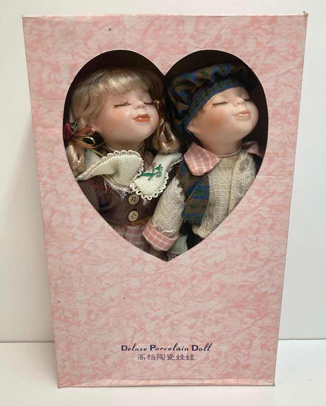 Photo 1 of DELUXE PORCELAIN DOLL COLLECTIBLE HAND CRAFTED BOY & GIRL DOLL