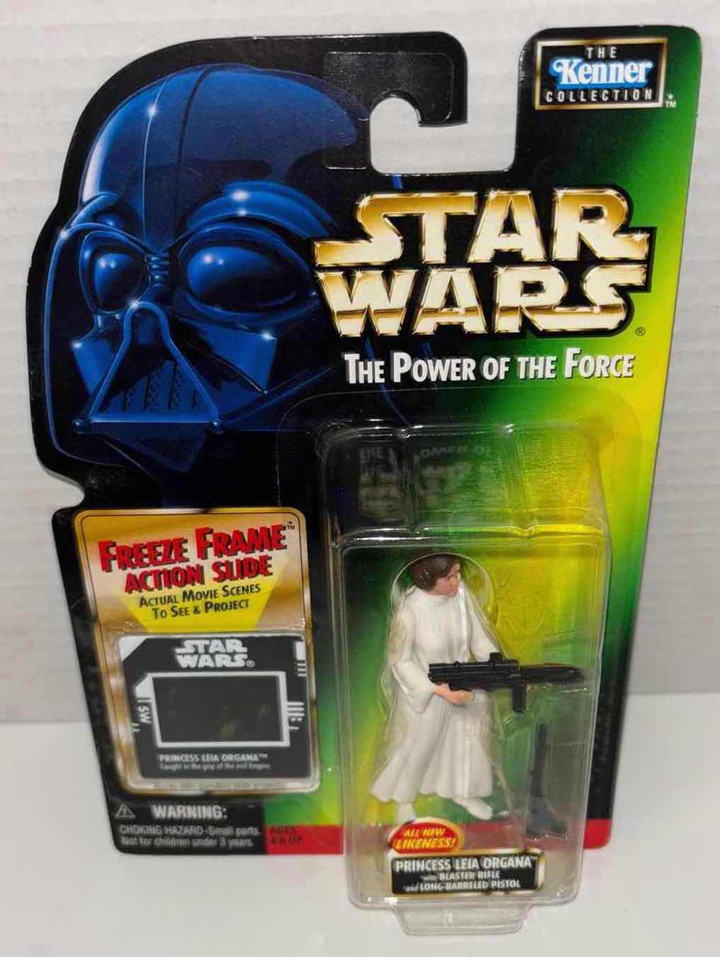 Photo 1 of NEW KENNER STAR WARS THE POWER OF THE FORCE ACTION FIGURE, PRINCESS LEIA ORGANA W BLASTER RIFLE AND LONG-BARRELED PISTOL W FREEZE FRAME ACTION SLIDE