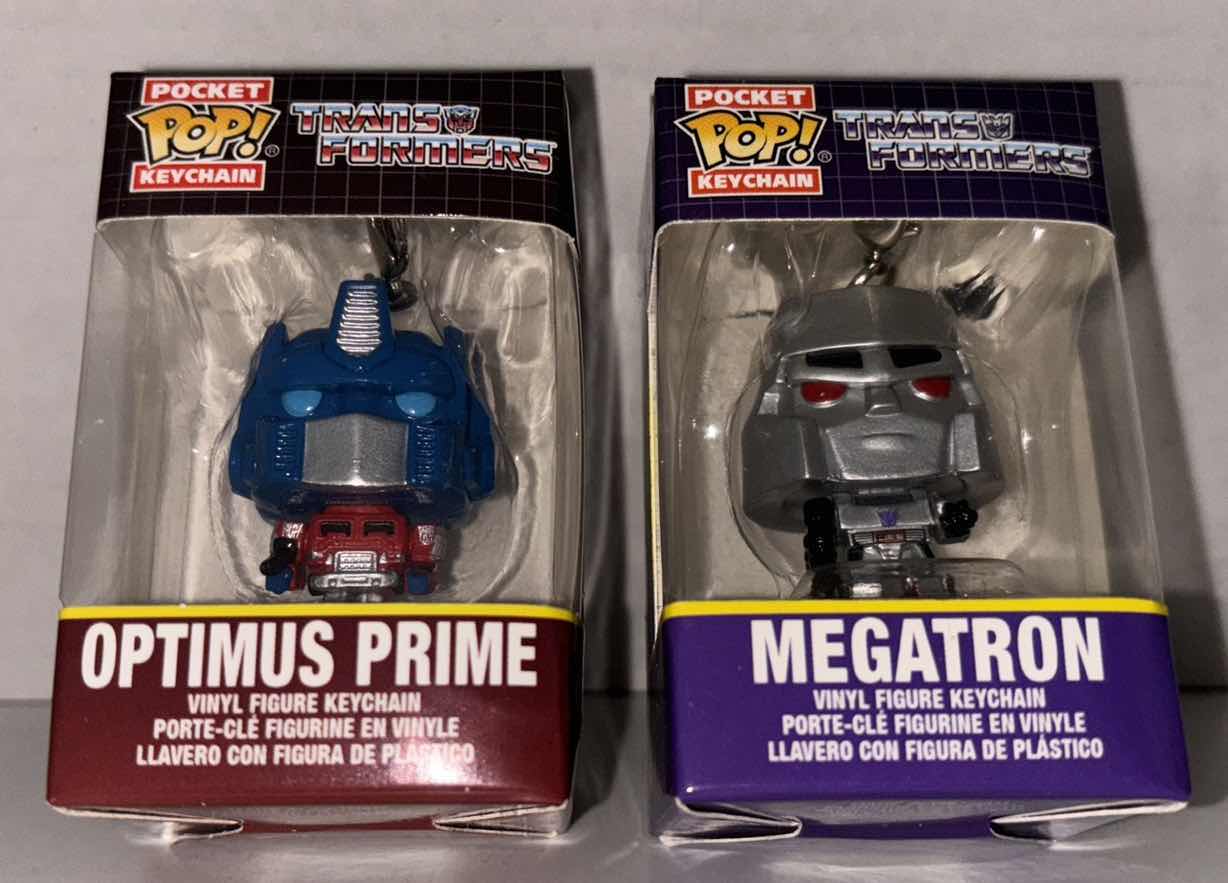 Photo 1 of NEW FUNKO POP! POCKET KEYCHAIN 2-PACK, TRANSFORMERS “OPTIMUS PRIME” & “MEGATRON”