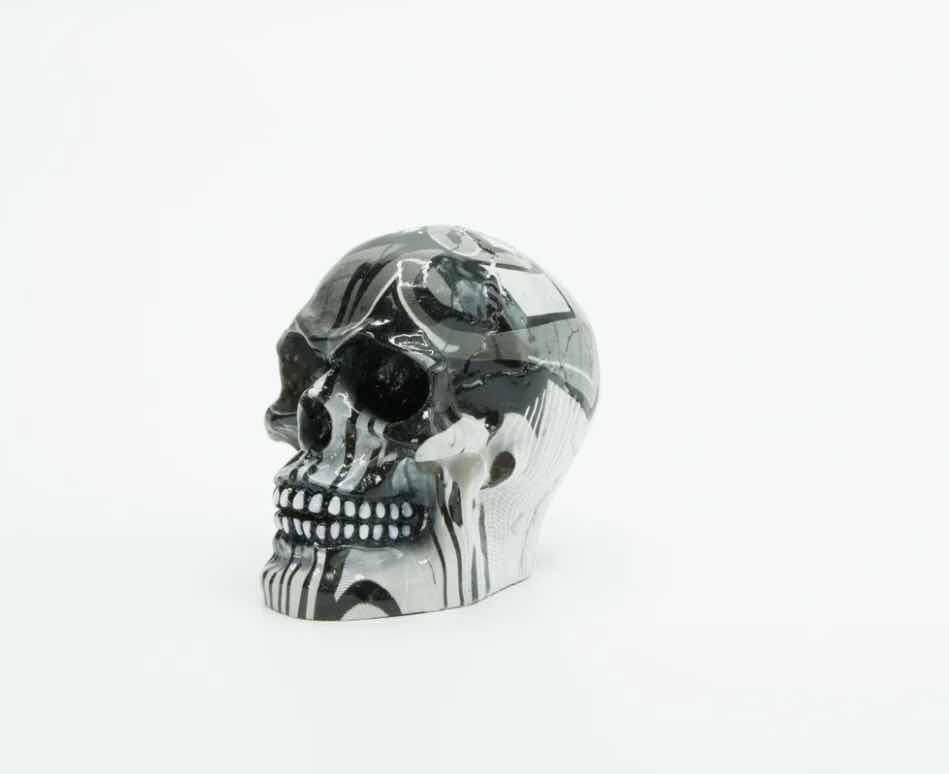 Photo 1 of BRANI BLACK & WHITE SMALL RESIN SKULL 2” x 3” x 3”