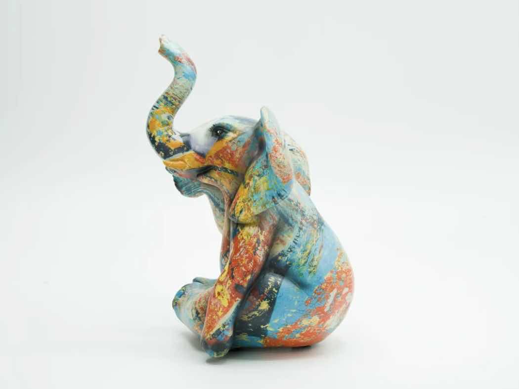 Photo 2 of BRANI COLORFUL RESIN ELEPHANT 5” x 6” x 8”