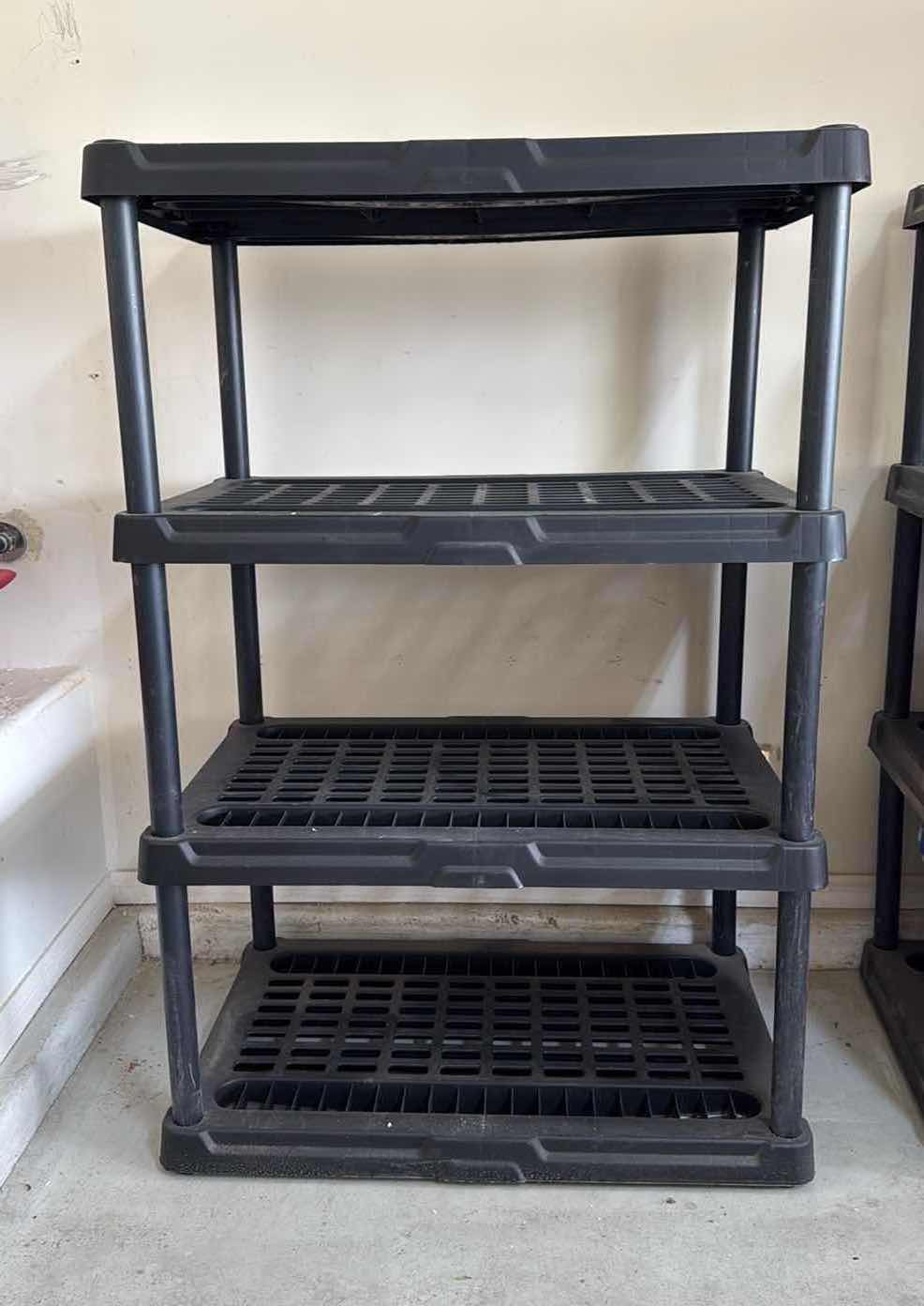 Photo 1 of BLACK HARD PLASTIC SHELVING UNIT 35”x24” H54”