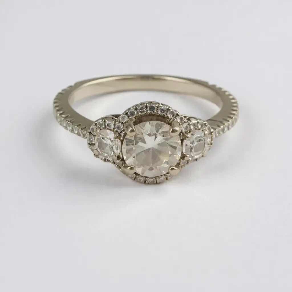 Photo 1 of 18K WHITE GOLD W 1.2ctw DIAMOND RING W INSURANCE APPRAISAL TTL GRAMS 3.20 (APPROX SIZE 6) TTL GRAMS 3.20 ITEM #2002  