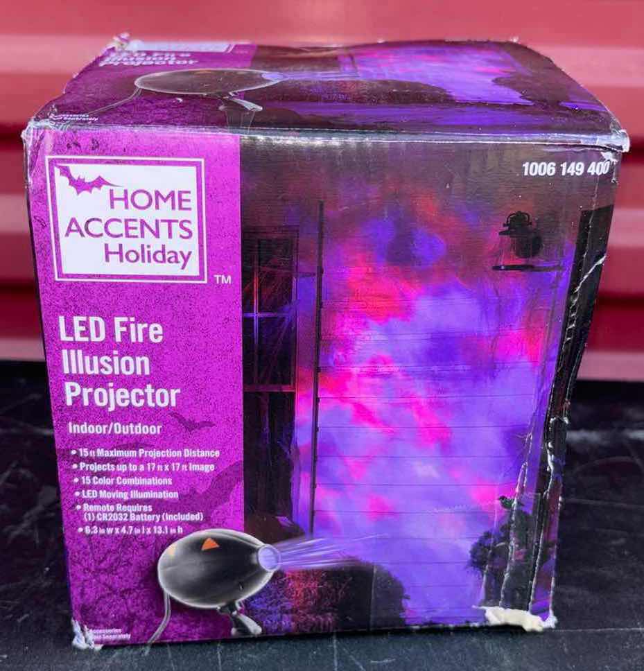 Photo 1 of HOME ACCENTS HOLIDAY LED FIRE ILLUSION PROJECTOR