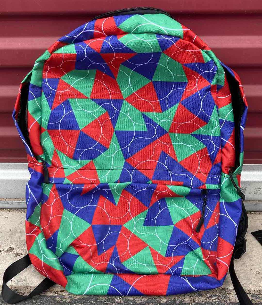 Photo 1 of BLUE, RED & GREEN BACKPACK