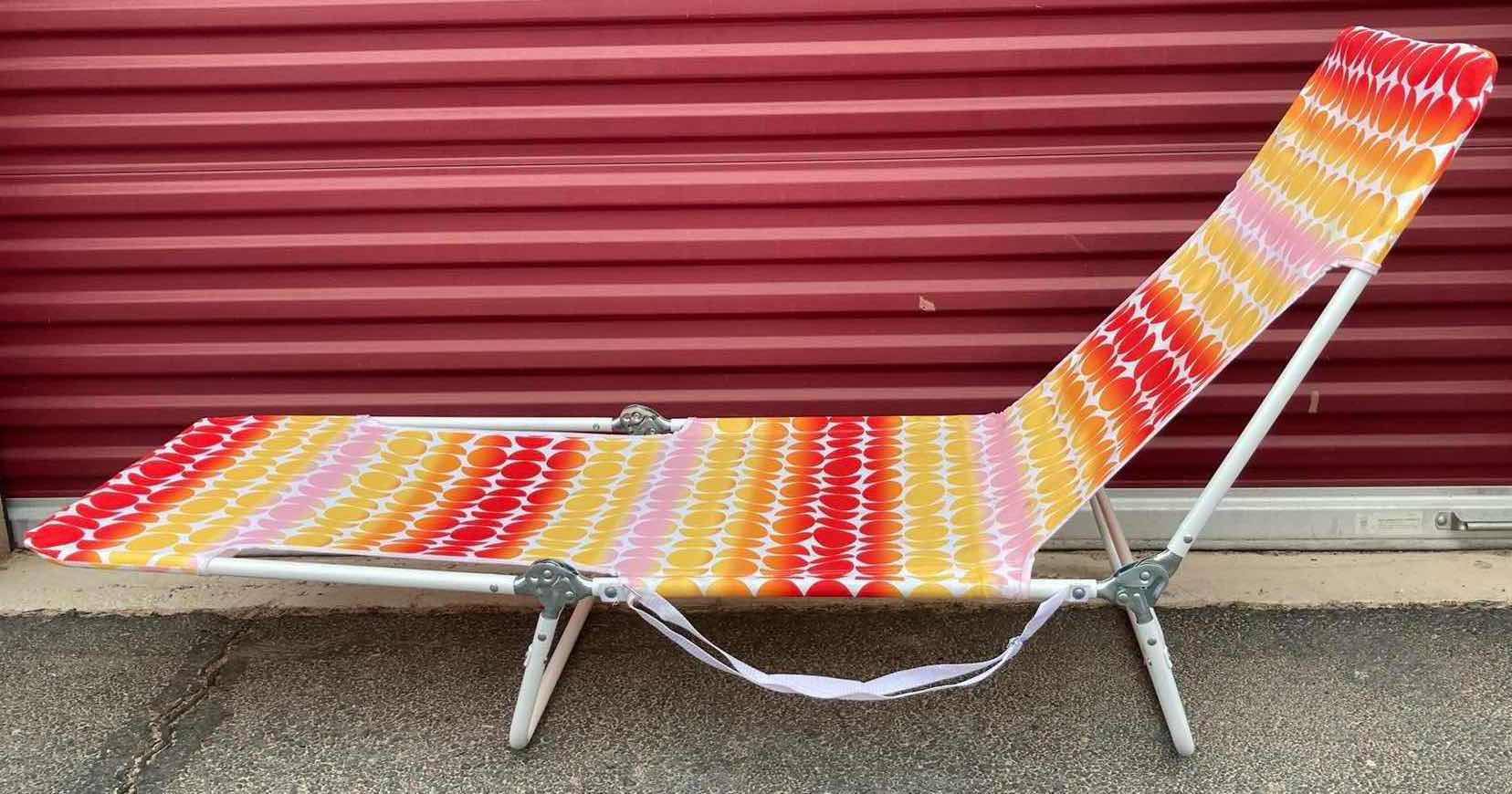 Photo 1 of SUN SQUAD GEO GRADIENT PRINT FOLDING BEACH LOUNGER 21.97” X 73.25” H9.25”