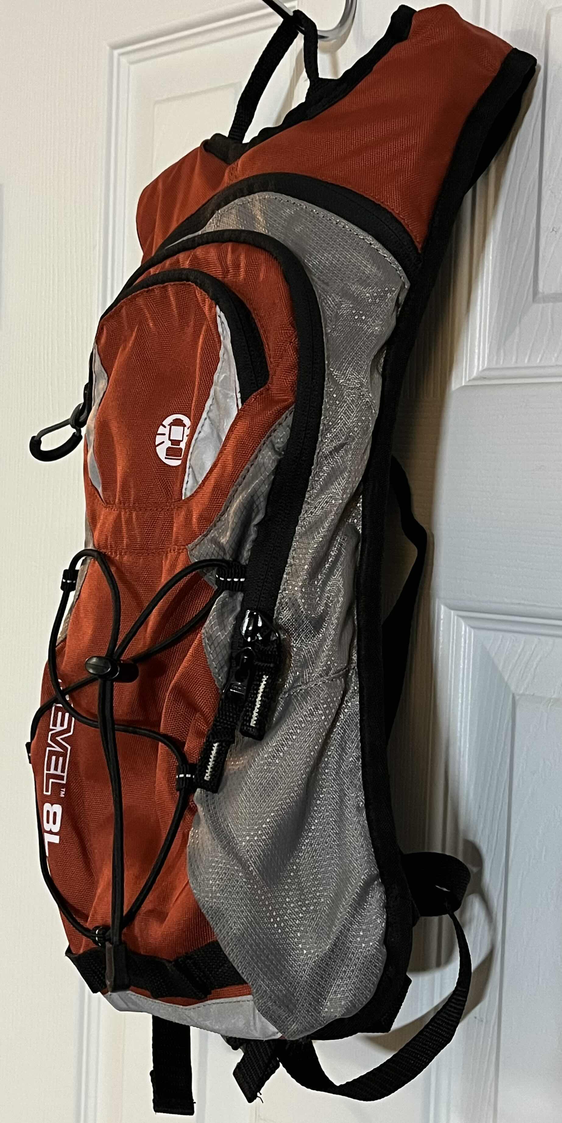 Photo 3 of COLEMAN REVEL 8L ORANGE & GRAY HYDRATION BACKPACK W 2LITER BLADDER