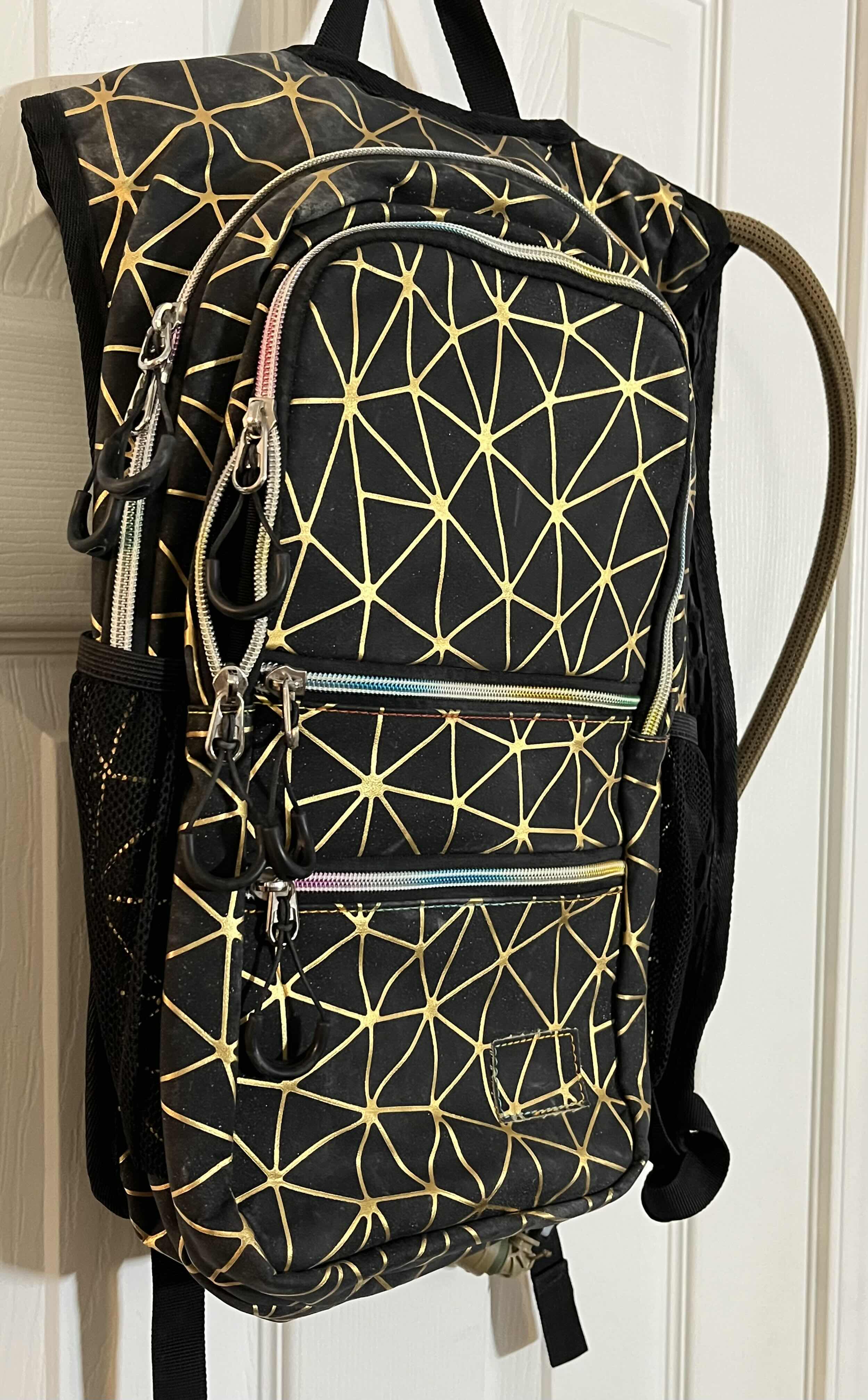 Photo 3 of RAVE RUNNER STYLE BLACK W GOLD & RAINBOW HYDRATION BACKPACK W 3LITER BLADDER